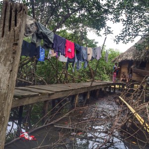 Here is one of the communities.  You can see how easy it is to not see a machete that was left in the mud.  Kids walk around barefoot so you can imagine that the majority of their injuries are on their feet. 