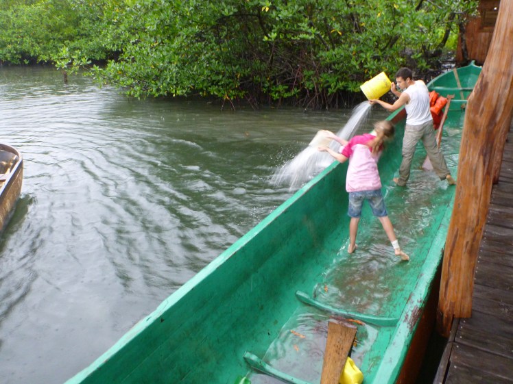 Pat & Ellie bailing out the large Cayuco 