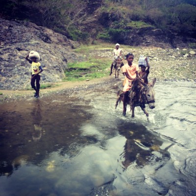 kids on the their way home from the market